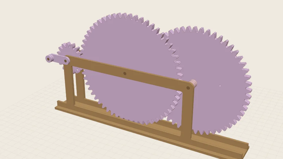 Two large laser-cut gears and a small pinion in a frame with a crank